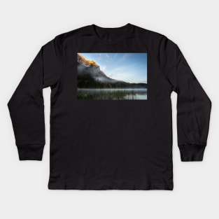 Mist on Alp mountain at Ferchensee. Amazing shot of the Ferchensee lake in Bavaria, Germany, in front of a mountain. Scenic foggy morning scenery at sunrise. Kids Long Sleeve T-Shirt